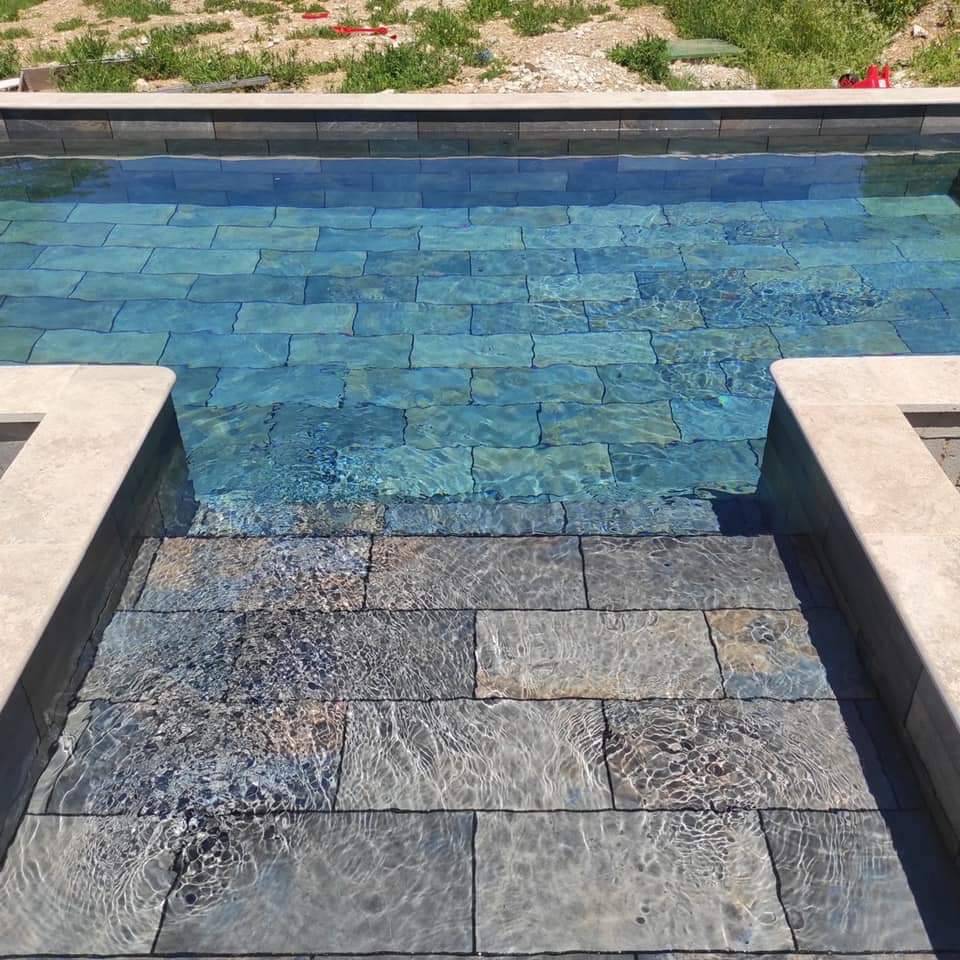 piscine béton armé forme libre sur mesure